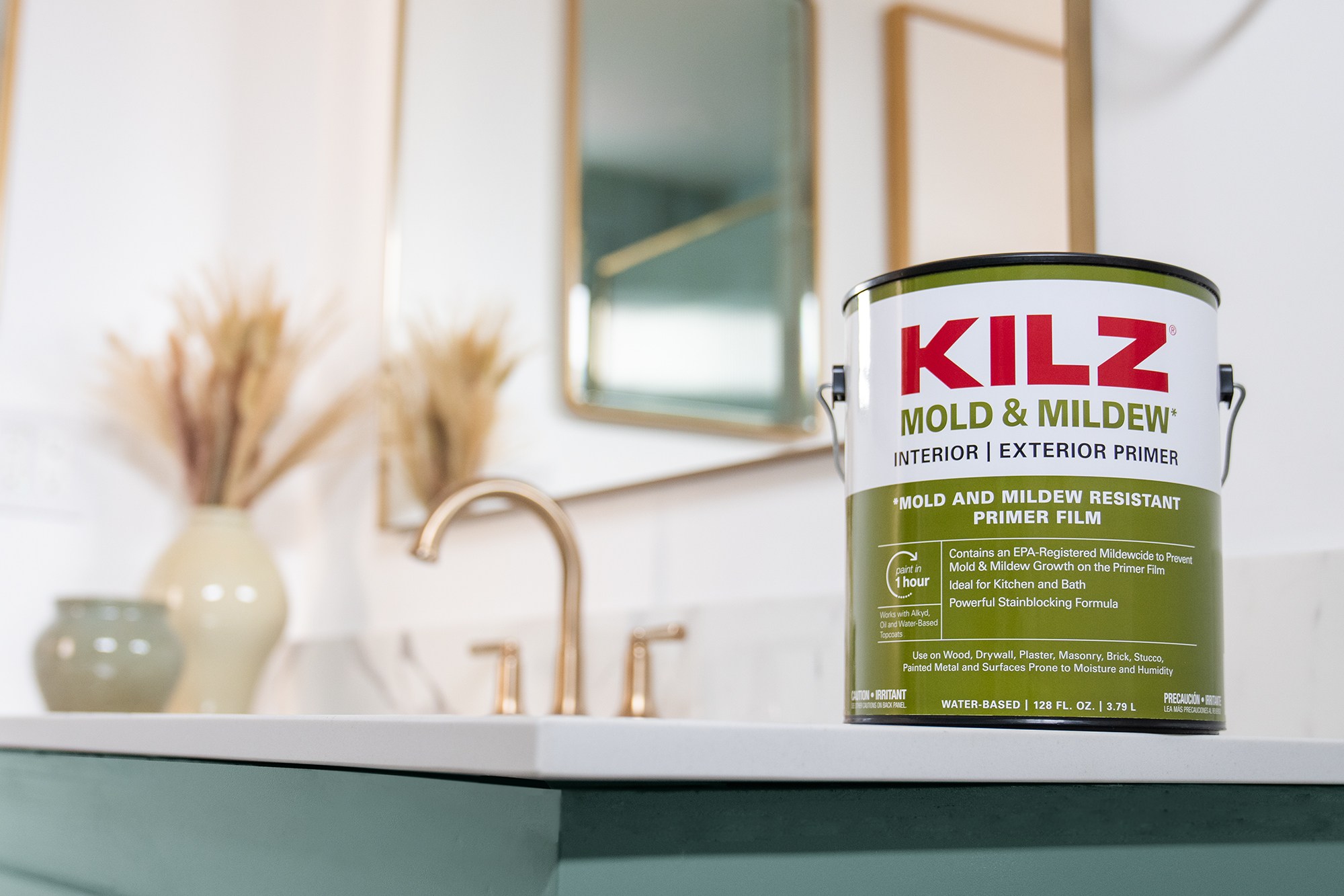 A gallon of KILZ Mold & Mildew on a bathroom countertop.